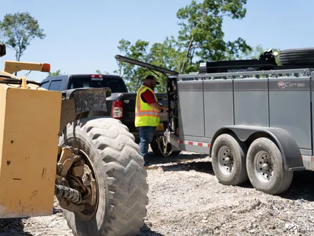 Person working with MTT at a worksite.